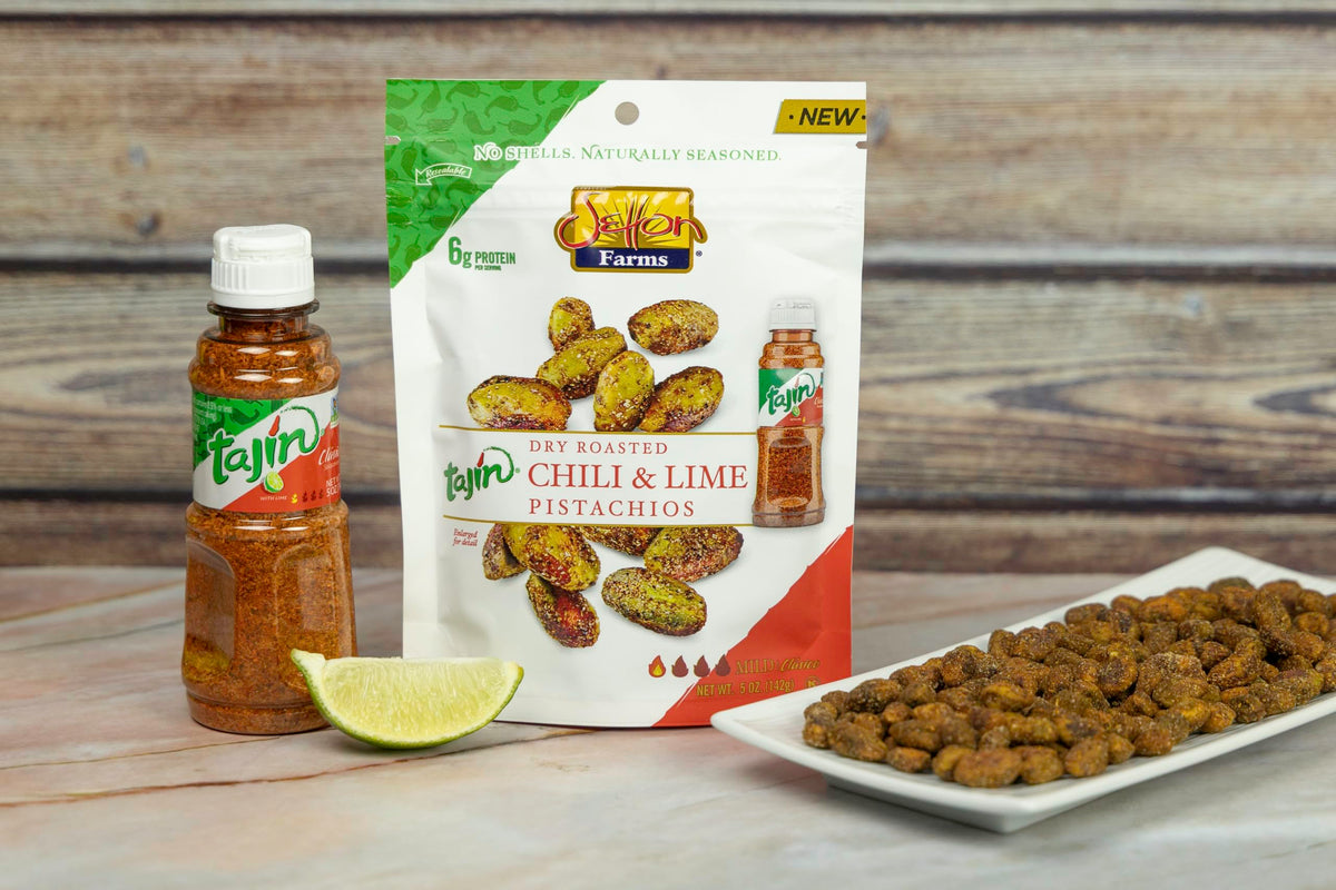 Value-size 20 oz packaging of Setton Farms Tajin Chile Lime pistachios.