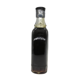 Shady Maple Farm 16.9-ounce bottle on kitchen shelf, pantry staple.