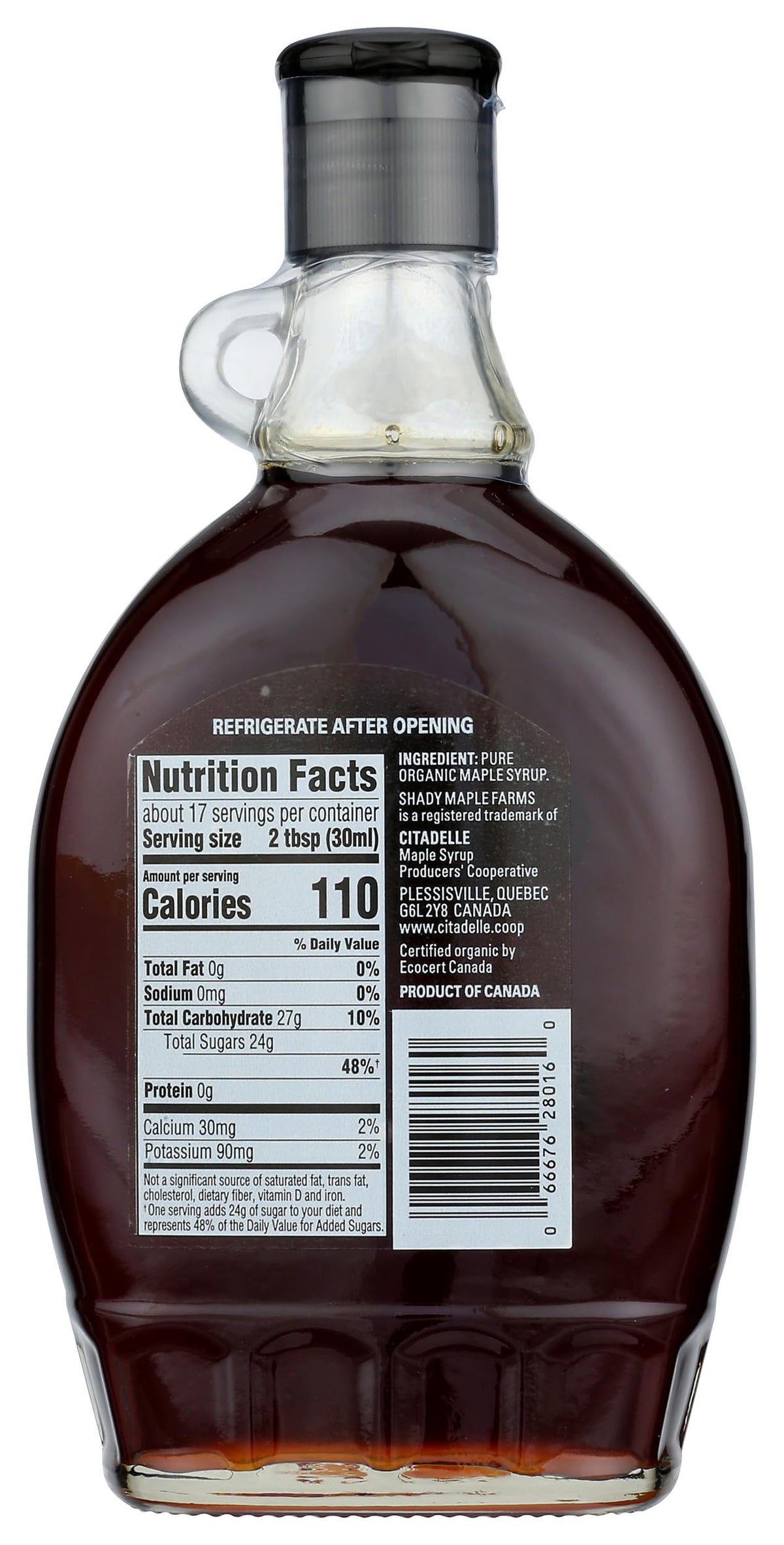 Shady Maple Farm maple syrup pouring glaze over pancakes, adds robust sweetness.