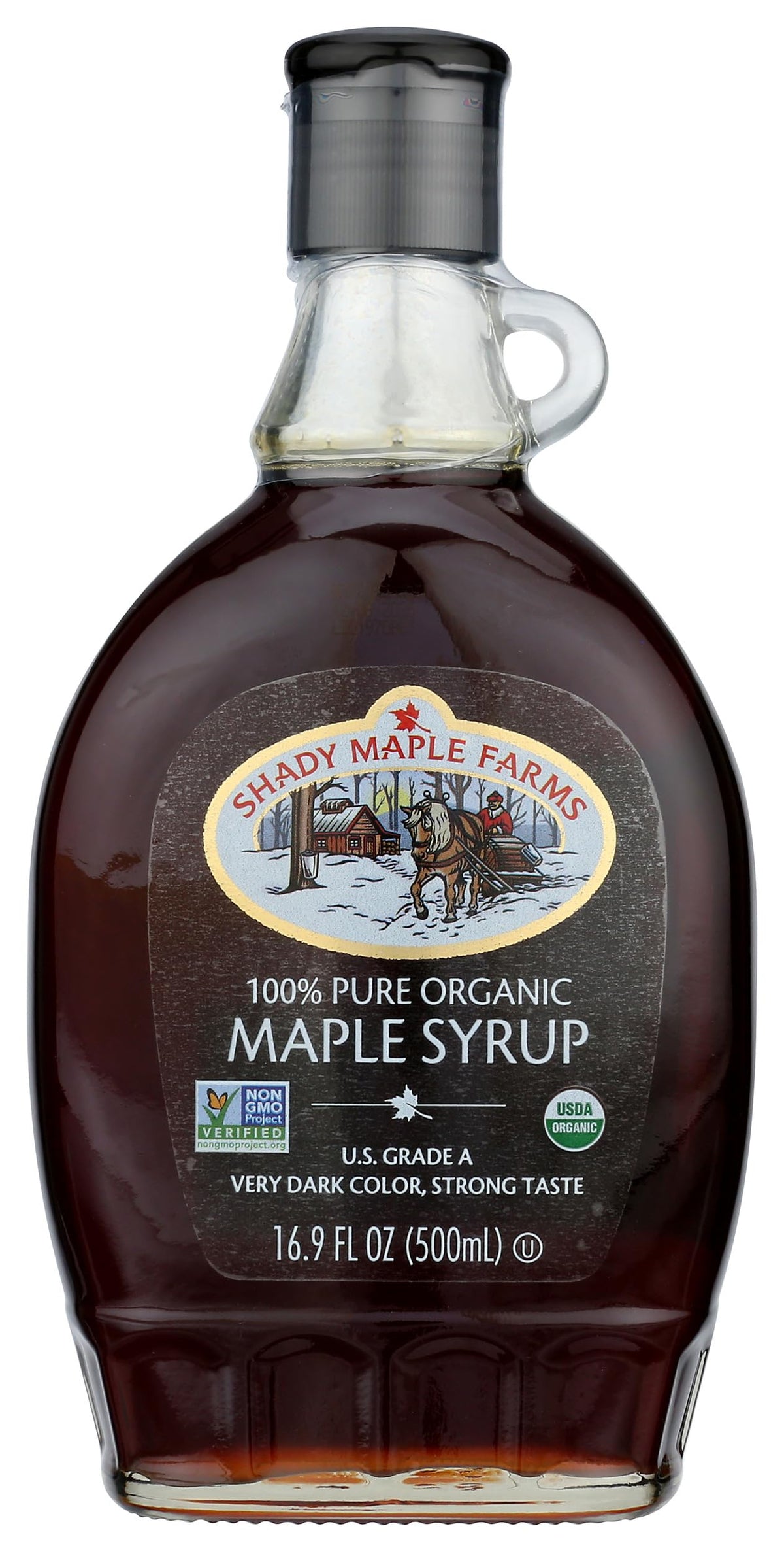 Shady Maple Farm very dark maple syrup bottle on counter, rich flavor for breakfasts.