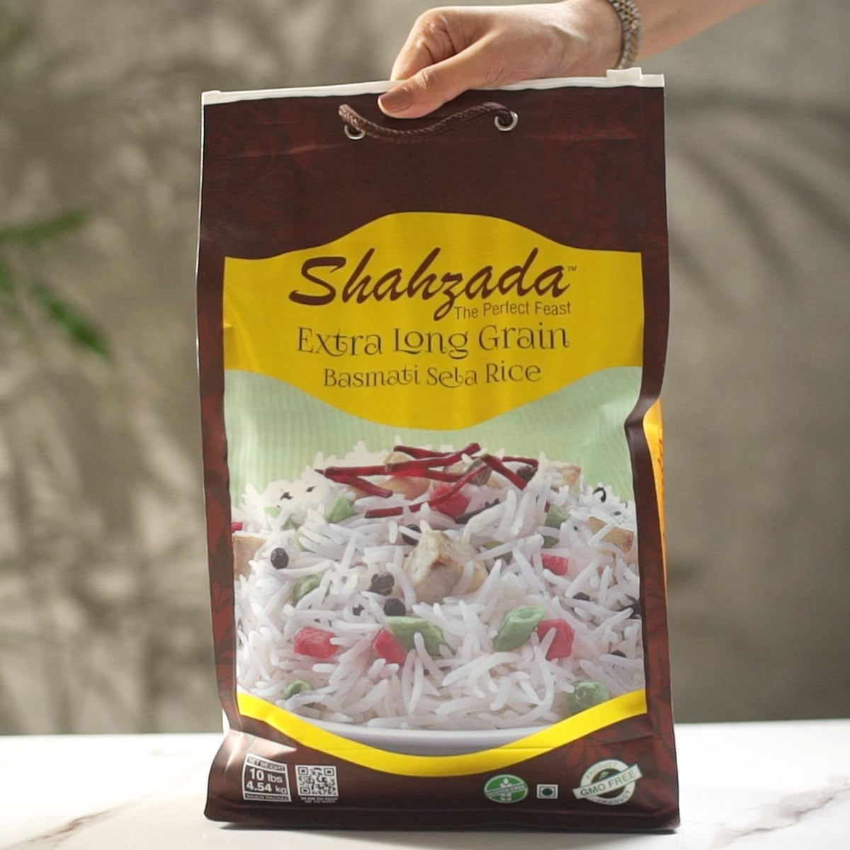 Shahzada Basmati Sela Rice raw grains close-up showing extra long slender grains