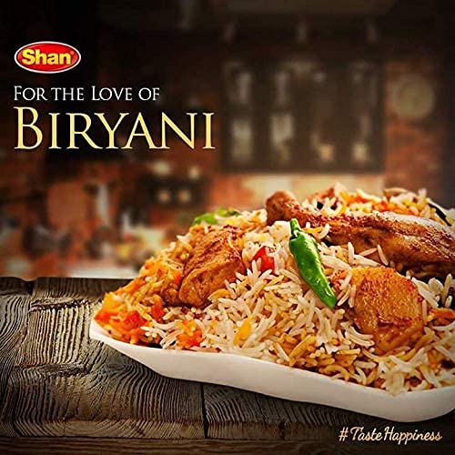 Close-up of Shan Biryani Masala spices and herbs.