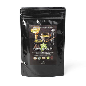 Shimane Organic Farm Mulberry Matcha powder in a cup, caffeine-free tea substitute.