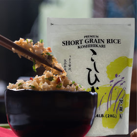 Shirakiku Koshihikari steamed rice in bowl with soft sticky texture.