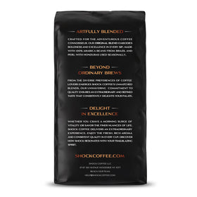 Shock Coffee Ground pours into a cup, delivering a robust aroma for productivity.