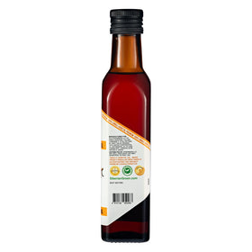 Siberian Green Sea Buckthorn Oil in a clear bottle shows natural hue