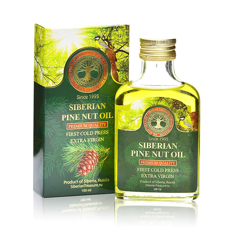 Siberian Treasure pine nut oil bottle on wood, premium oil for culinary use.