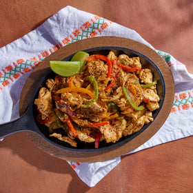 Siete Chicken Fajita Seasoning bag close-up highlights clean ingredients.