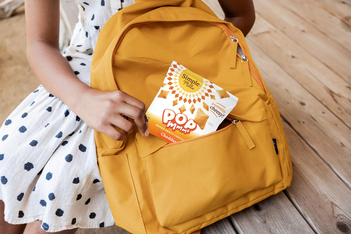 Simple Mills Pop Mmms Cheddar eight-pack snack packs for easy lunchbox snacking.