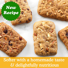 Simple Mills Spiced Carrot Cake Bar in hand, ideal for on-the-go breakfasts.