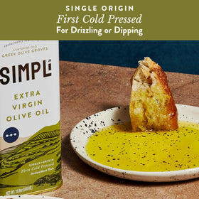 SIMPLi olive oil drizzle on salad showcases vibrant, herbaceous finish.