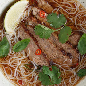 Steamy bowl of pho made with Simply Asia Pho Beef Broth