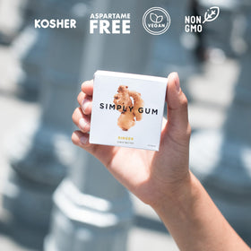 Outdoor scene of Simply Gum Ginger six-pack for on-the-go freshness.