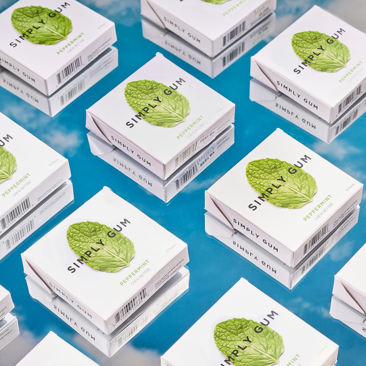 Simply Gum Peppermint gum being pulled from pack for on-the-go freshness