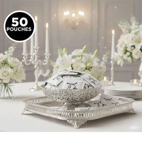 Close-up of a wedding favor display featuring Simply Gum mints.