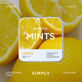Simply MINTS six-tin bundle on a clean desk for easy access.