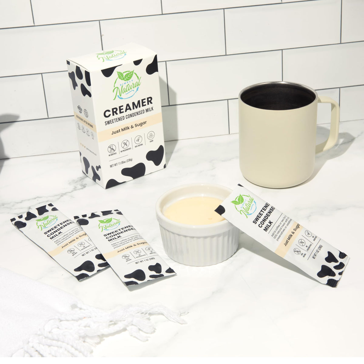 Camping scene with Simply Natural creamer sachets for portable sweetness