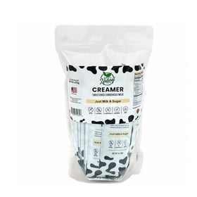 Pouring Simply Natural creamer sachet into coffee for creamy sweetness