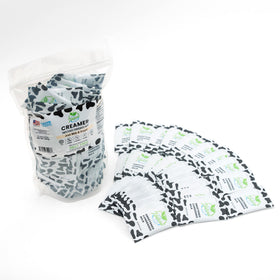 Simply Natural Sweetened Milk Creamer sachet poured into coffee for creamy sweetness
