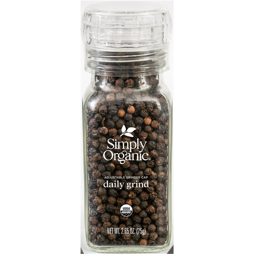 Simply Organic Daily Grind peppercorns in a glass bottle for fresh, adjustable seasoning.