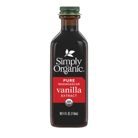 Simply Organic Madagascar Vanilla Extract in a glass jar being poured for smoothies
