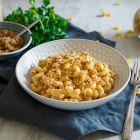 Simply Organic Nutritional Yeast sprinkled on popcorn for nutty, umami seasoning.