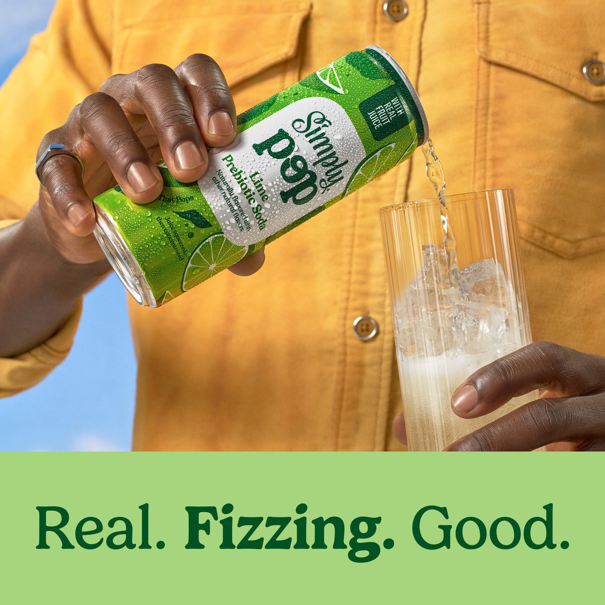 Close-up of Simply POP Lime label highlighting real fruit juice and vibrant color.