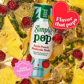 Serving glass of Simply POP Fruit Punch on ice with fruity aroma