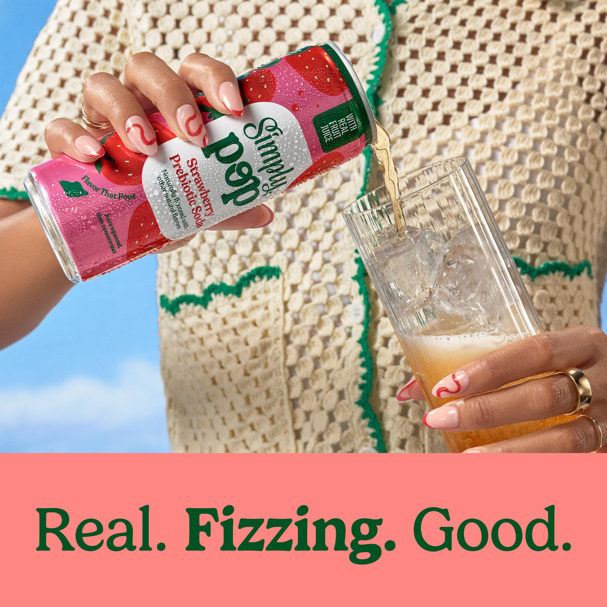 Close-up of Simply Pop Strawberry label highlighting non-GMO and real fruit juice
