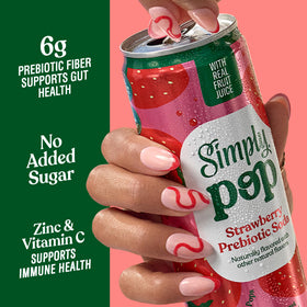 Pouring Simply Pop Strawberry into a glass with bright fizz