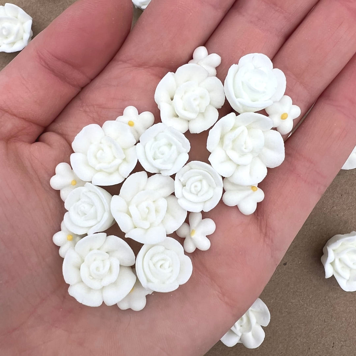 Simply Sucré white icing flowers for elegant wedding cakes.