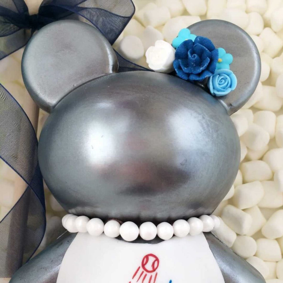 Simply Sucré edible royal icing flowers blue white for versatile cake decor