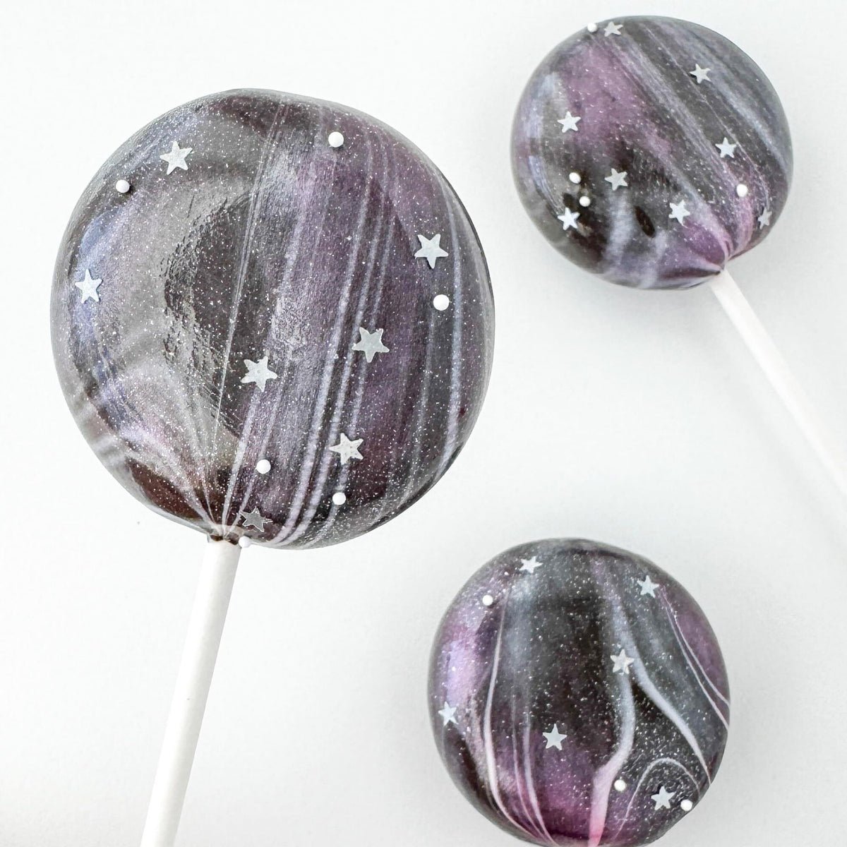 Simply Sucré glitter stars in a drink for shimmering, dye-free garnish