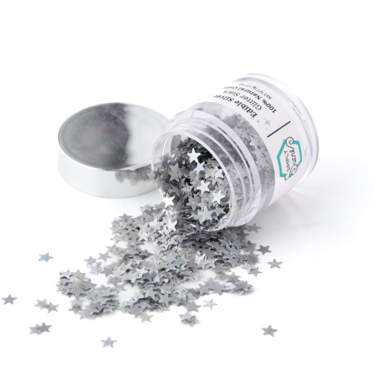 Simply Sucré dye-free glitter stars on cake for a glamorous vegan sparkle