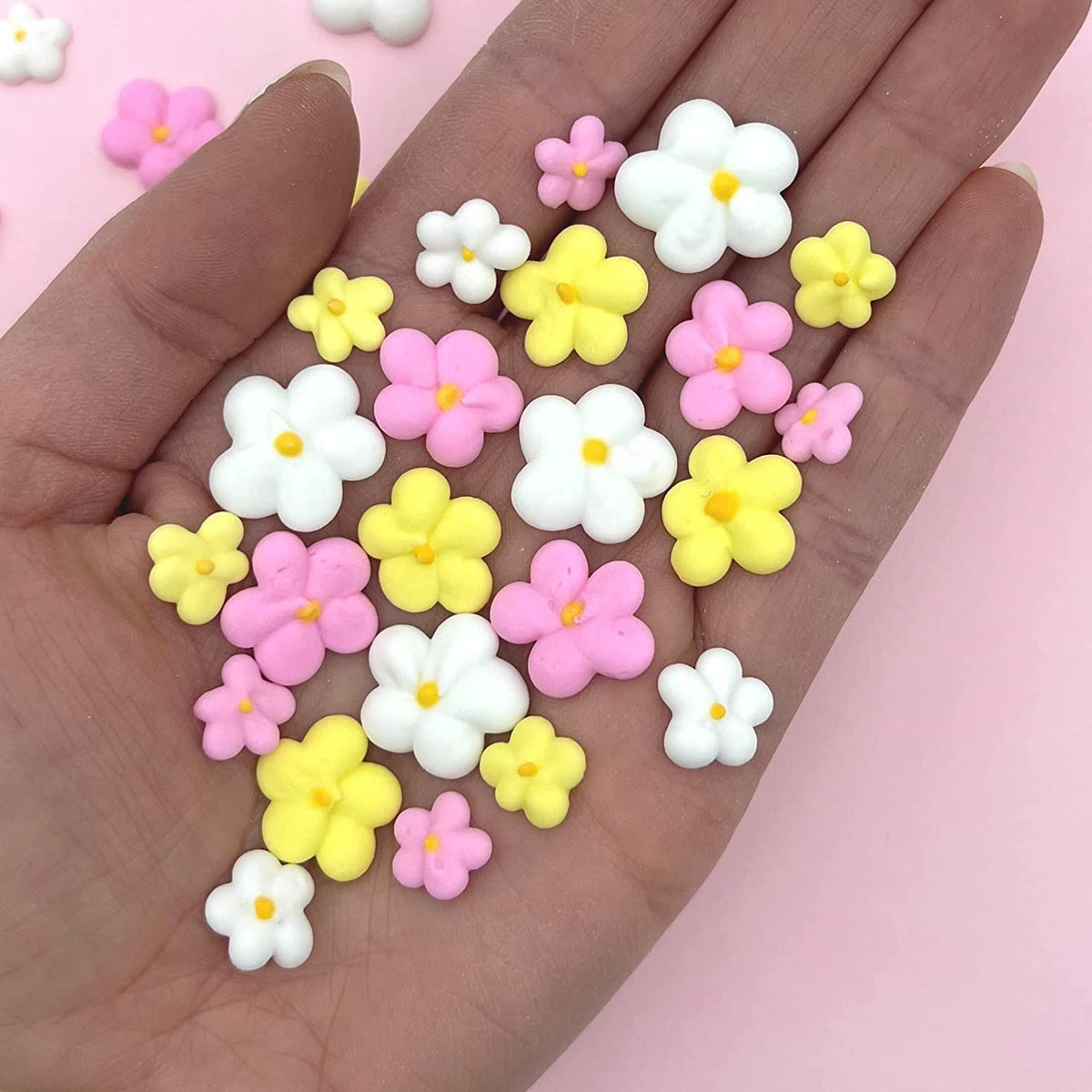 Simply Sucré mini edible flowers serve as quick cake toppers for cupcakes and cookies.