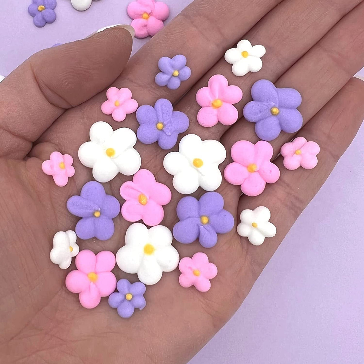 Simply Sucré royal icing blossoms close-up for professional cake decorating touch