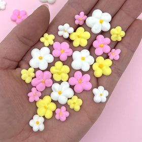 Simply Sucré royal icing blossoms decorate cakes with elegant, ready-to-use charm.