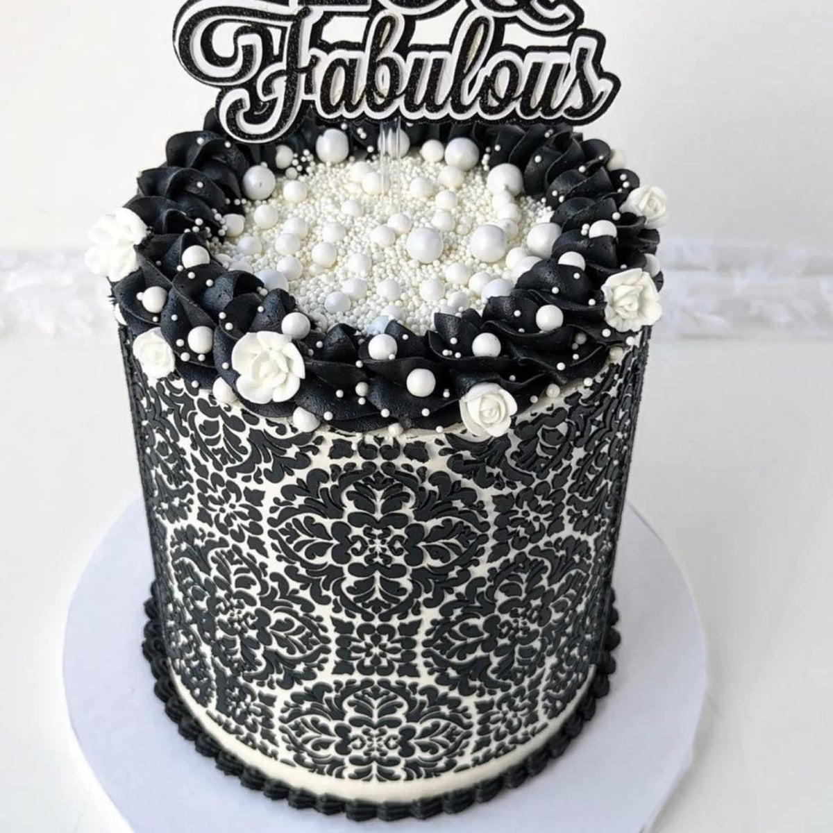 Simply Sucré royal icing flowers for desserts and displays.