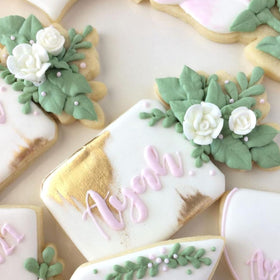 Simply Sucré small edible royal icing roses for favors.