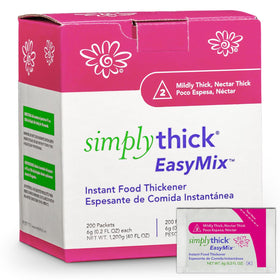 SimplyThick EasyMix packet being poured into a glass to create nectar-thick beverage