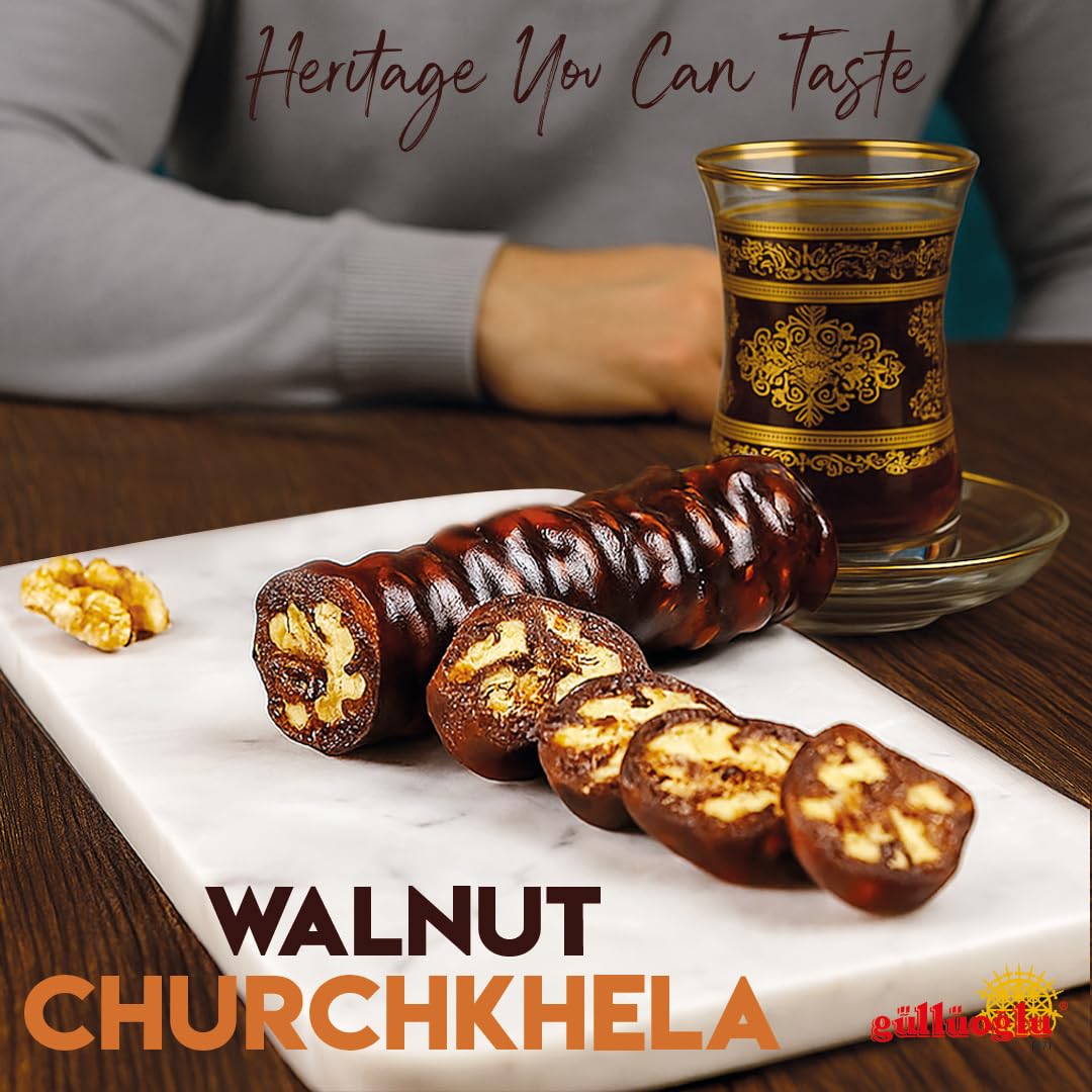 Gulluoglu Walnut Churchkhela slice on plate, ideal with cheese or tea.