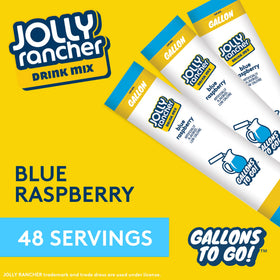 JOLLY RANCHER blue raspberry stick dissolving in water to boost flavor in a gallon pitcher.
