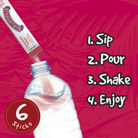 Finished Margaritaville Strawberry Daiquiri drink in a glass with lime