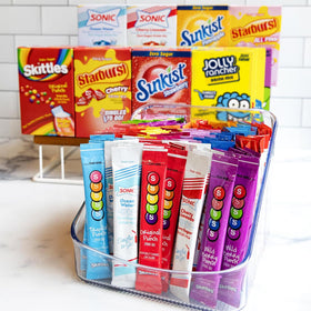 Singles To Go packets pour into water for fast flavor enhancement