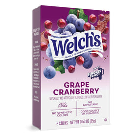 Pouring Welch’s grape cranberry into a bottle for quick flavor boost