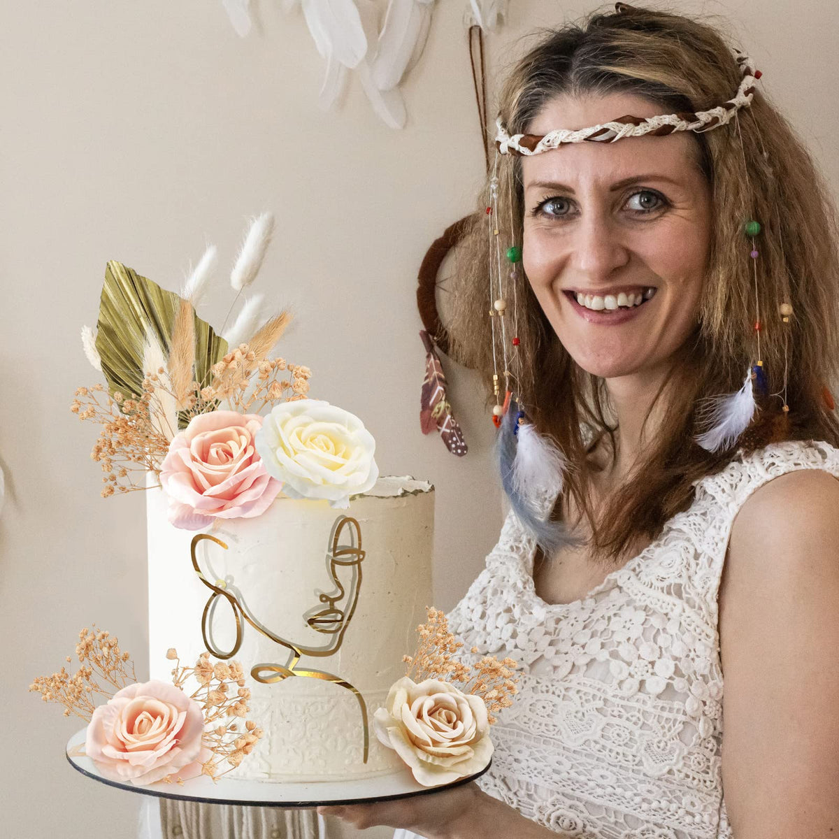 Sinmoe artificial rose topper pairs with florals for bridal cake styling