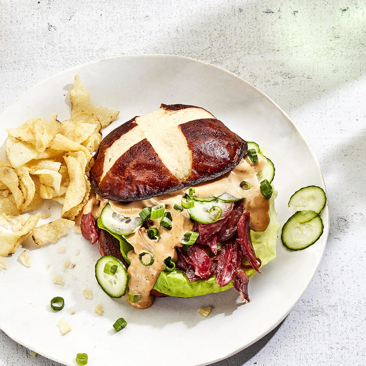 An open sandwich featuring Sir Kensington's Chipotle Mayo for a zesty finish.