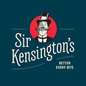 Sir Kensington's ketchup being poured, ideal for dipping fries or burgers.