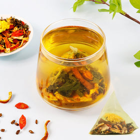 SIRDIKA prepared cup of Goji Berry Chrysanthemum Tea with bright aroma