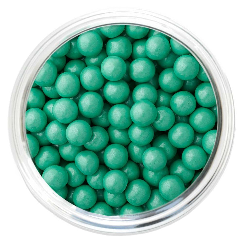 Sixlets turquoise shimmer chocolate balls for decorative dessert displays.
